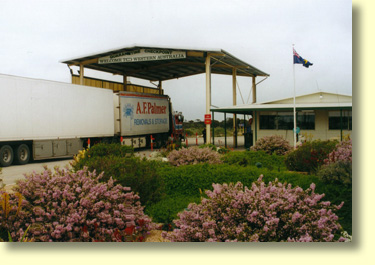 Western Australia's agricultural checkpoint will conduct a compulsory search of your vehicle. You will be required to hand in fruit, vegetables, plant matter, honey and other items. Crossing the border can be a quite tramatic  experience for vegetarians!