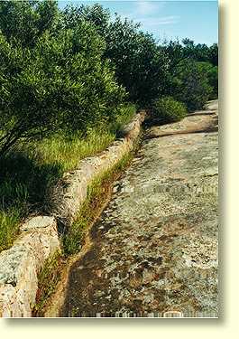 ioneering farmers such as the Kwaterski family constructed gutters to channel water runoff from Pildappa Rock.