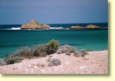 View of Mexican Hat.  A limestone "sombrero formation" -  west of Fowlers Bay and southwest of Nundroo. To get there ask for local advice from Nundroo Roadhouse or Fowlers Bay Kiosk.  Good beach fishing and budget camping can be found in the area.  Warning: Do not swim on these beaches!